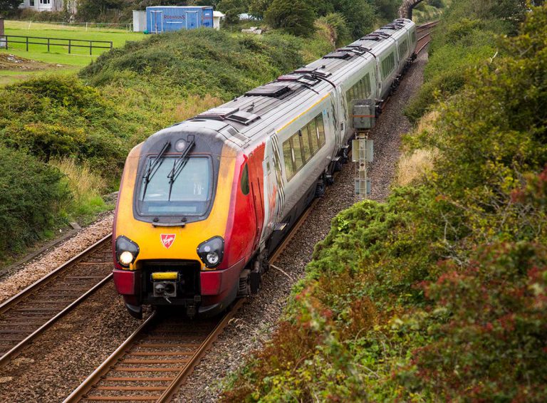 Virgin Train moving through the countryside