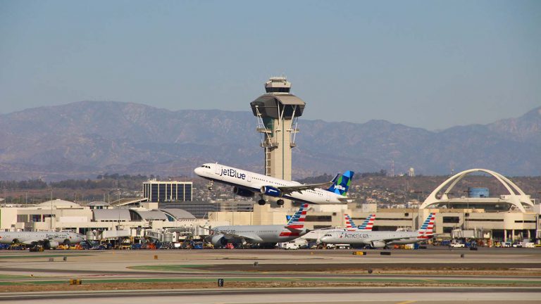 JetBlue flight departs LAX.