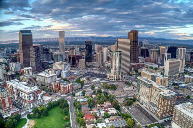 Tall buildings of brown and grey in downtown Denver.