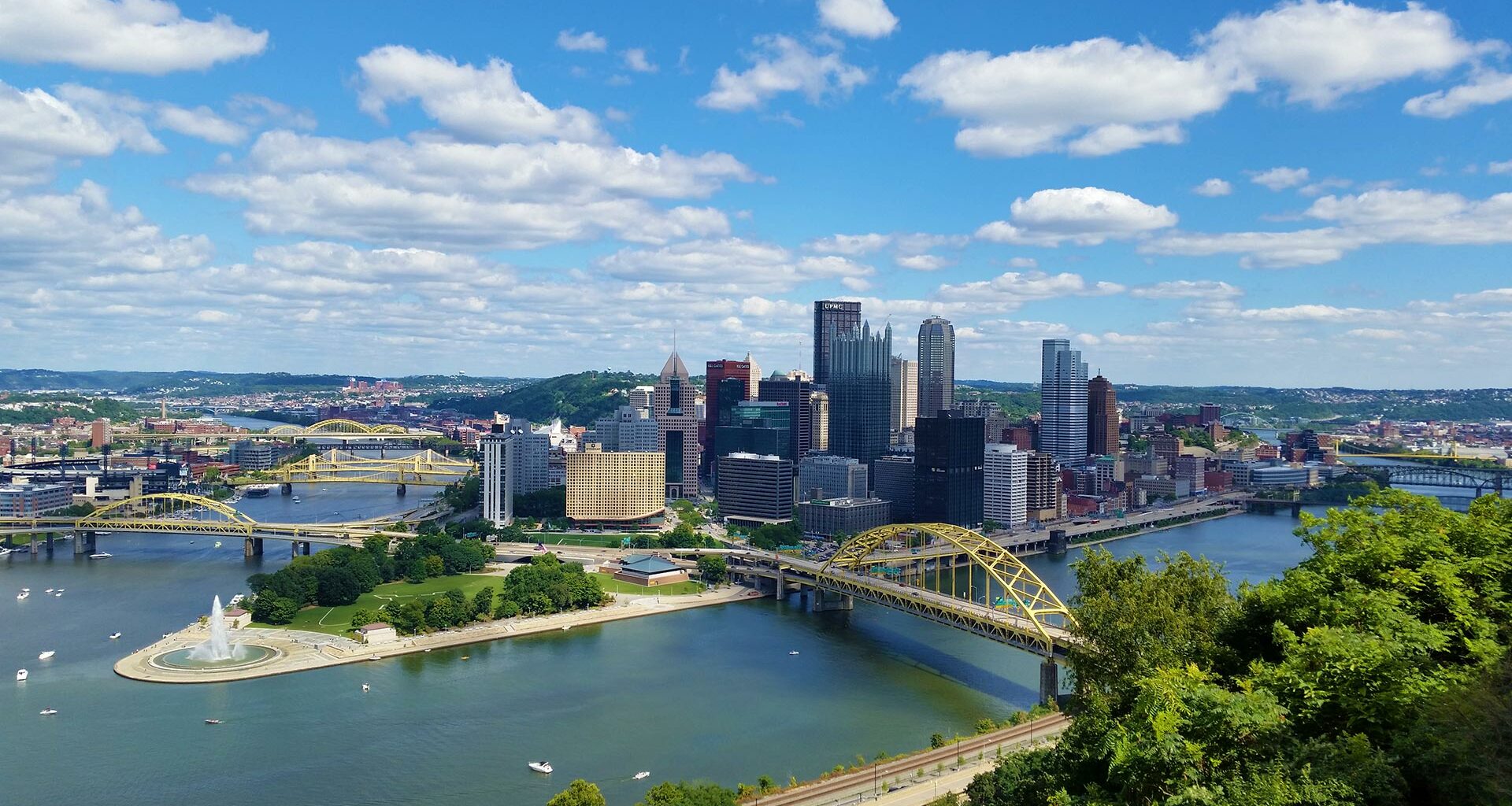 Multiple skyscrapper buildings in Pittsburgh as viewed from up on Mt. Washington.