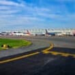 Different planes standing at different gates at the Washington National airport.