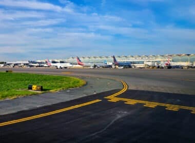 Different planes standing at different gates at the Washington National airport.