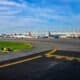 Different planes standing at different gates at the Washington National airport.